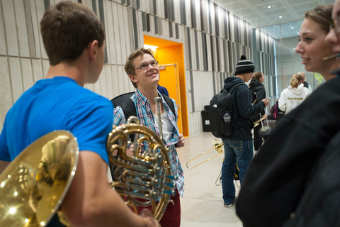 Friends talking before a rehearsal