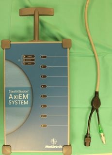 AxiEM System power box with cords for connecting to the base unit.