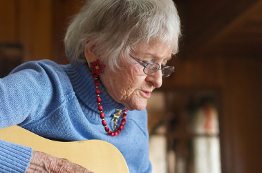 Woman playing guitar Woman playing guitar