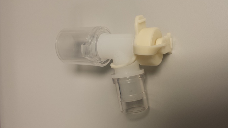 Trach sweivel connector: item number 906857. It's clear with a tan peice for the bronch to go into; this is the piece you want